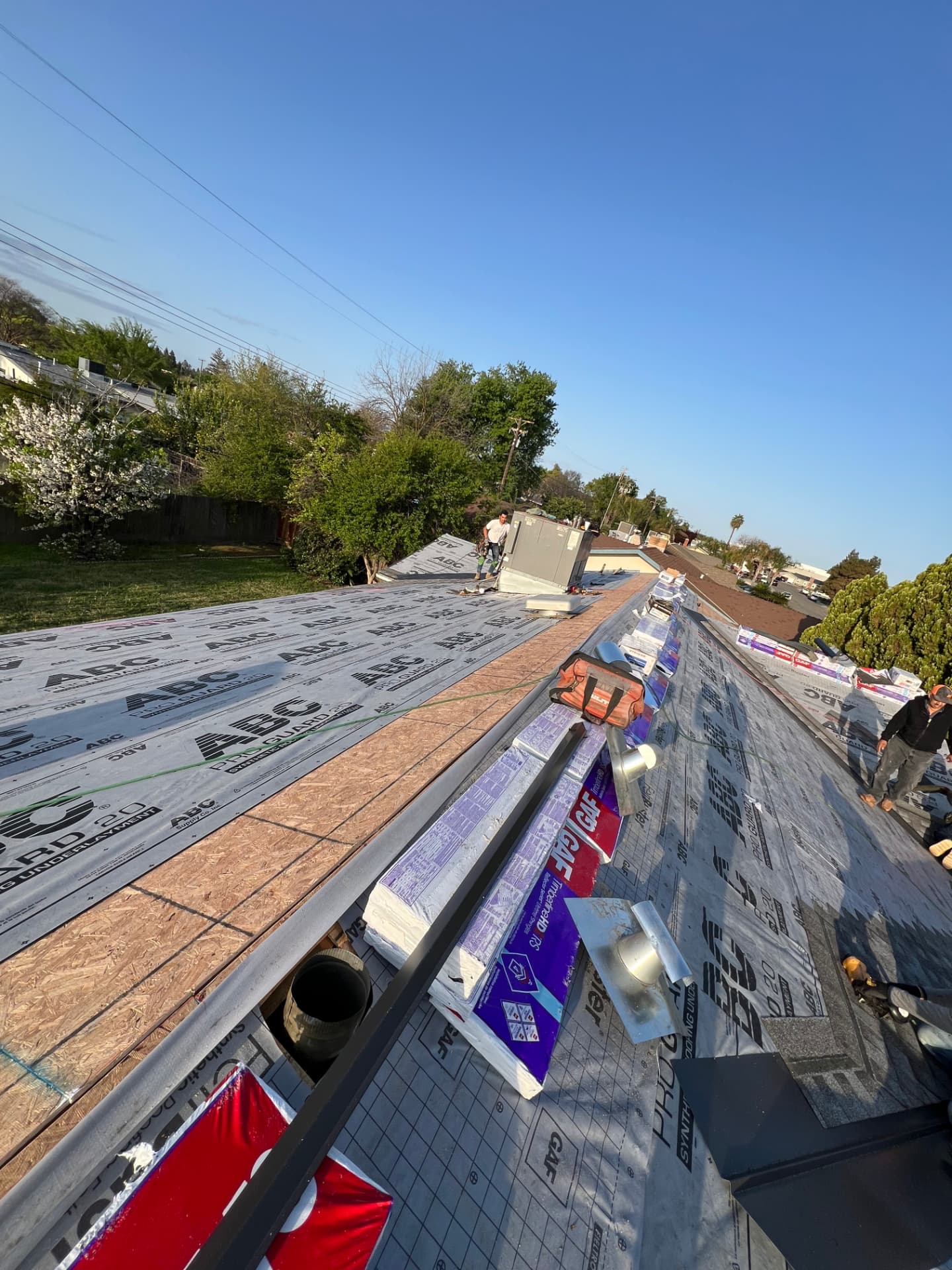 Synthetic underlayment and new plywood decking ready for shingles